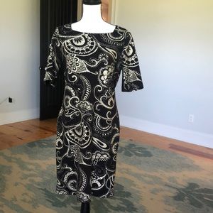 Black and gold shift dress.